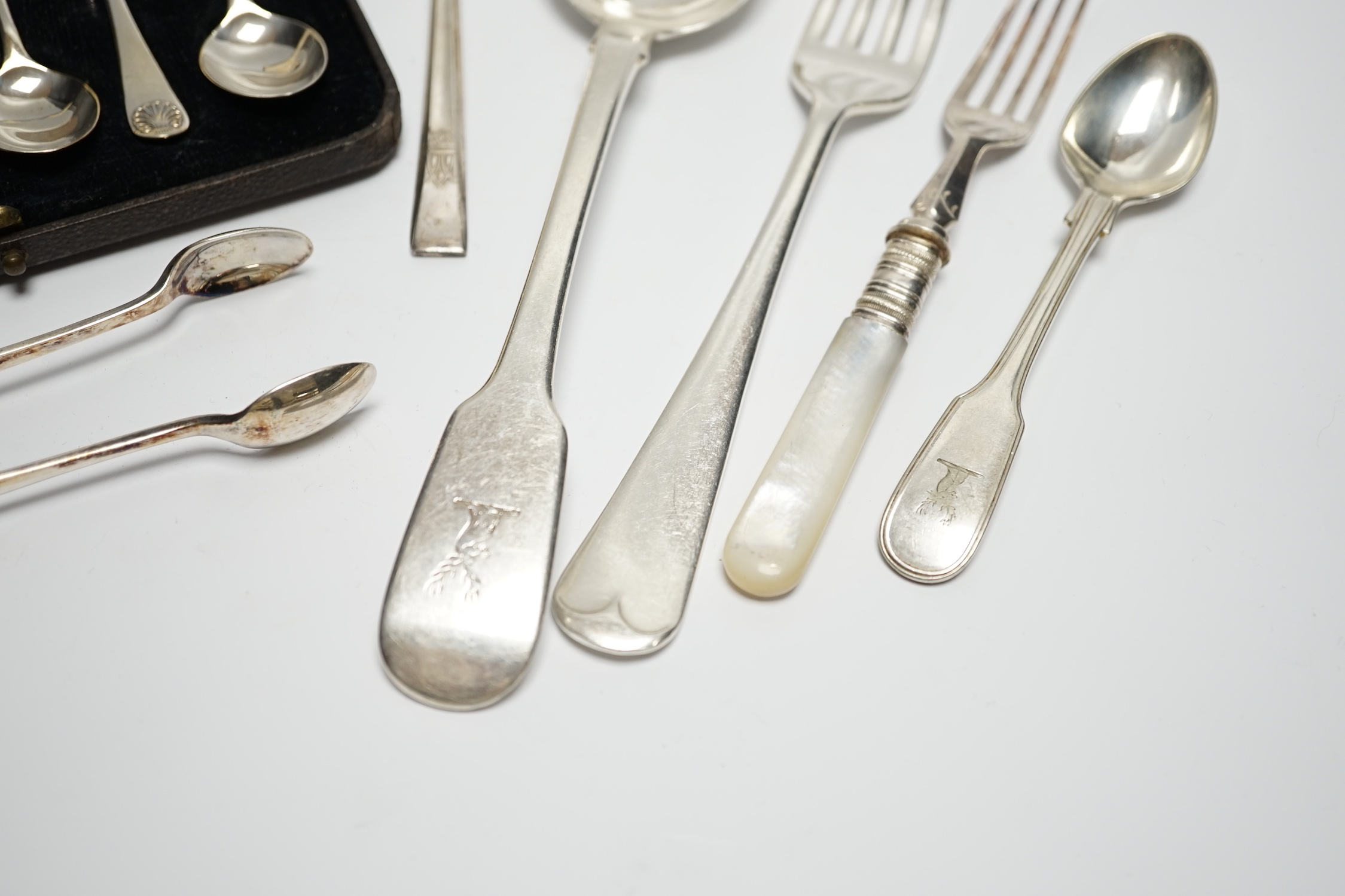 A group of assorted 19th century and late silver flatware, various patterns, dates and makers, including a set of six Hanovarian pattern dessert forks by George Adams, London, 1852(worn) and a cased set of six coffee spo